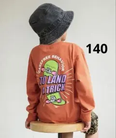 長袖Tシャツ オレンジ スケートボード バックプリント