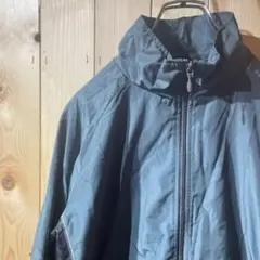 AE6176 NEW BALANCE ウインドブレーカー チャコールグレー