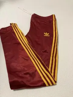 【古着】adidas バーガンディ 3本ライン トラックパンツ