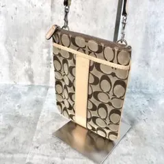 COACH コーチ シグネチャー柄 縦型ショルダーバッグ 斜めがけ ロゴプリント