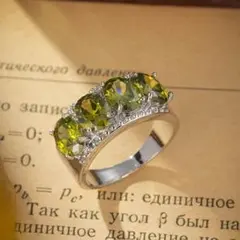 R*u様 【サイズ１２号/送料無料】オーバルカットCZ４石リング