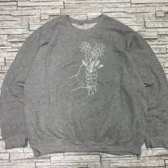 GILDAN スウェット グレー 花束 人物 アートデザイン USA古着