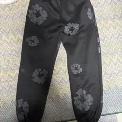 DENIM TEARS スウェットパンツ ブラック