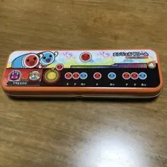 ゲーム　太鼓の達人　どんちゃん　缶ケース　小物入れ　入れ物　ペンケース　オレンジ