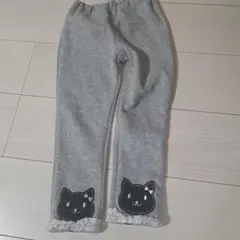 猫顔と足跡デザインのスウェットパンツ