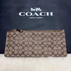 美品　コーチ　COACH　フラットポーチ（フラットウォレット）　シグネチャー柄のサムネイル