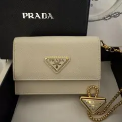 新品】 PRADA プラダ スタッズドレザー 二つ折り 財布 白 - メルカリ