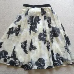 JUSGLITTY ジャスグリッティー ひざ丈 スカート 花柄 ブラックイエロー