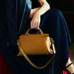 POTIOR タッセルハンドバッグ