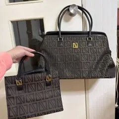 Diana Valentino ダイアナバレンチノラウンスモールハンドバッグ 