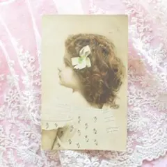 *アンティークポストカード　カーリーヘアとリボンが可愛い少女　1907年