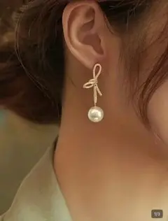 リボン パール ピアス ゴールド 韓国 インポート 揺れる ビジュー 華やか