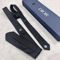 PRADA プラダネクタイトライアングルロゴブラック - メルカリ