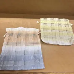 未使用品 イエロー オレンジ ブルー ホワイトの色合いの2種類の巾着袋