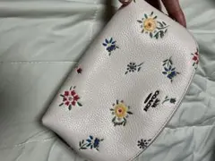 coach花柄ホワイトポーチ