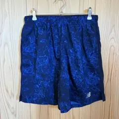 美品　ニューバランス　トレーニングハーフパンツ　L 総柄　インナーパンツありのサムネイル