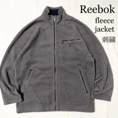 Reebok リーボック 刺繍ロゴ グレー フリースジャケット リペアあり 古着