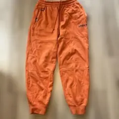adidas ADVENTURE オレンジ スウェットジョガースパンツ