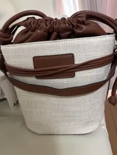 新作 ベージュ 巾着型かごバッグ