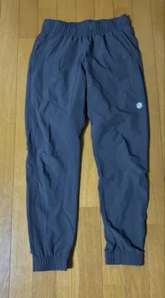 アシックス　asics グレー ジョガーパンツ　ダメージ　メンズ　ナイロンパンツ