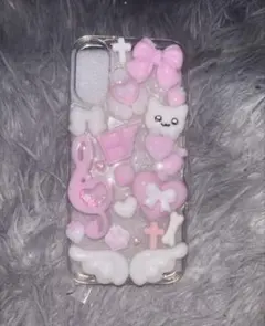 iPhone16ケースデコ シャカシャカデコ電 ピンクし 白 ねこ