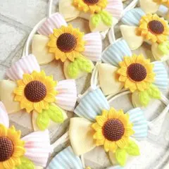 トリミングチョーカー ひまわりリボン 20本 - メルカリ