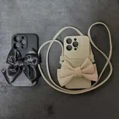 iPhone 14Pro スマホケース 黒 ベージュ リボンショルダースマホ