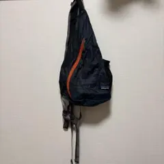 patagonia ボディバッグ 黒 - メルカリ