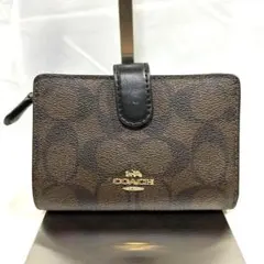 COACH 二つ折り財布 ダーク シグネチャー ブラウン