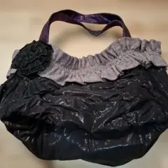 TUNIC光沢のある黒と紫のバッグ