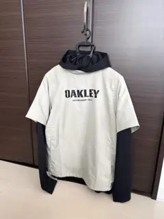 OAKLEY ゴルフ　フード付きパーカーライトグレー/ブラック