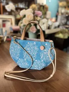 2つの柄が楽しめる『丸みを帯びた2way バッグ』ストラップ付ミナペルホネン