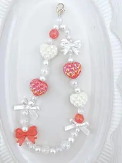 【現品限り】ぷっくりハート×リボンのキラキラビーズストラップ C194