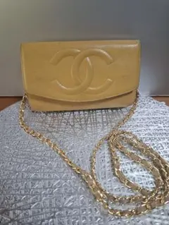限定セール‼️CHANEL ココボタン レザーポーチ イエロー - メルカリ