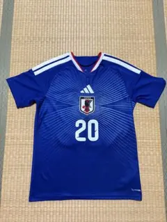 サッカー日本代表　鈴木淳之介　1stユニフォーム　W杯パッチ付き W杯選出‼️】日本代表ユニフォーム2026半袖モデル鈴木淳之介 25 - メルカリ