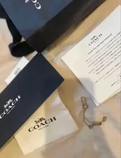 COACH チャーム付きブレスレット