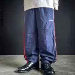 90s OLD UMBRO バギーナイロントラックパンツ 刺繍ロゴ Y2Kのサムネイル