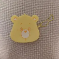 ケアベアシリコンポーチ　ファンシャインベア 黄色