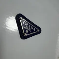 は*士様 PRADA ネイビー 三角形 ロゴプレート