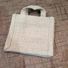 再々値下げ　無印良品　新品未使用　麻小物入れバッグ　ミニミニトートバッグのサムネイル