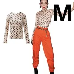 ベージュ色長袖Tシャツ 月模様