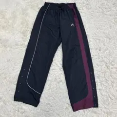 asics アシックス サイドスナップ ナイロン パンツ 古着 ネイビーのサムネイル