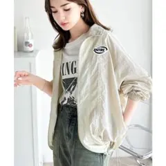 ENTIRE ロゴ入り ジップアップ ブルゾン アイボリーのサムネイル