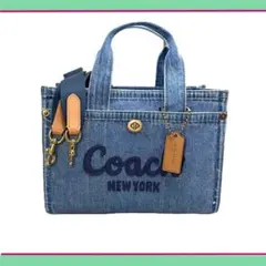 COACHコーチジャストサイズ24cmデニムブルーカーゴトートバッグ - メルカリ