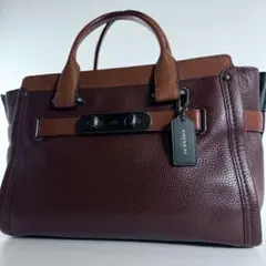 コーチ COACH バーガンディ レザー トートバッグ ハンドバッグ スワッガー