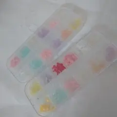 ケース付ネイルパーツデコパーツ大量まとめ売①ほぼリボンフラワーお花蝶々120個のサムネイル