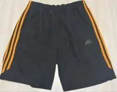 adidas 黒 メンズショートパンツ オレンジストライプ