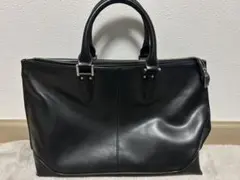 COACH グラム レザー ジップ トップ ブリーフ F70454 - メルカリ