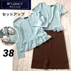 新品【エムズグレイシー】カーディガン　ペプラム　カメリア　フレア袖　ベージュ　M 2025年最新】エムズグレイシー カーディガン ペプラムの人気