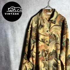 【長袖シャツ　総柄　幾何学的模様　アート　昭和レトロ　オレンジ　青　茶　古着】